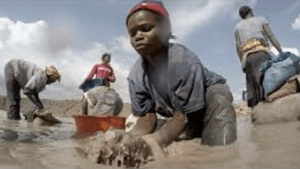 Some of the 40,000 children in the DRC who dig tunnels and haul rocks from cobalt mines in 2018. Cobalt is an essential mineral for the lithium-ion batteries used in electric vehicles, laptops and smart phones.